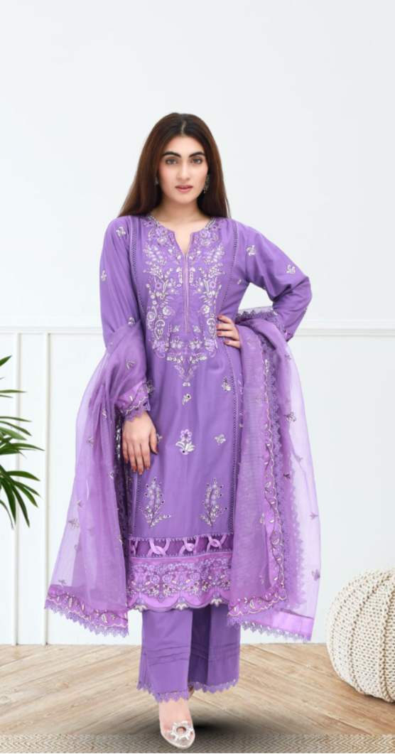 Daiselle-Woman wearing a purple traditional outfit with a white background